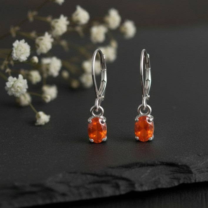 Flame Dance Drops: Natural Oval Fire Opal Dangle Earrings in Sterling Silver for wholesale by Princejewelshub