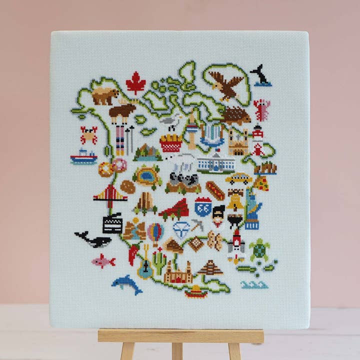 Nordamerikanskt äventyr - Karta-tematisk korsstygnssats för wholesale av Caterpillar Cross Stitch