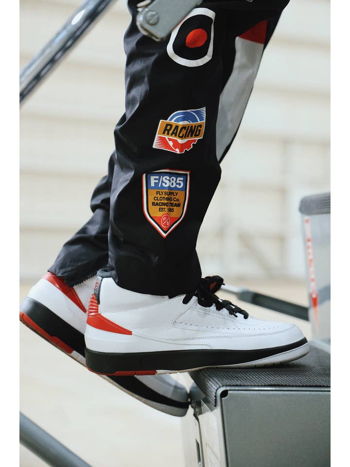 Black Paperchaser Windbreaker Pullover (Black) for wholesale on Faire17