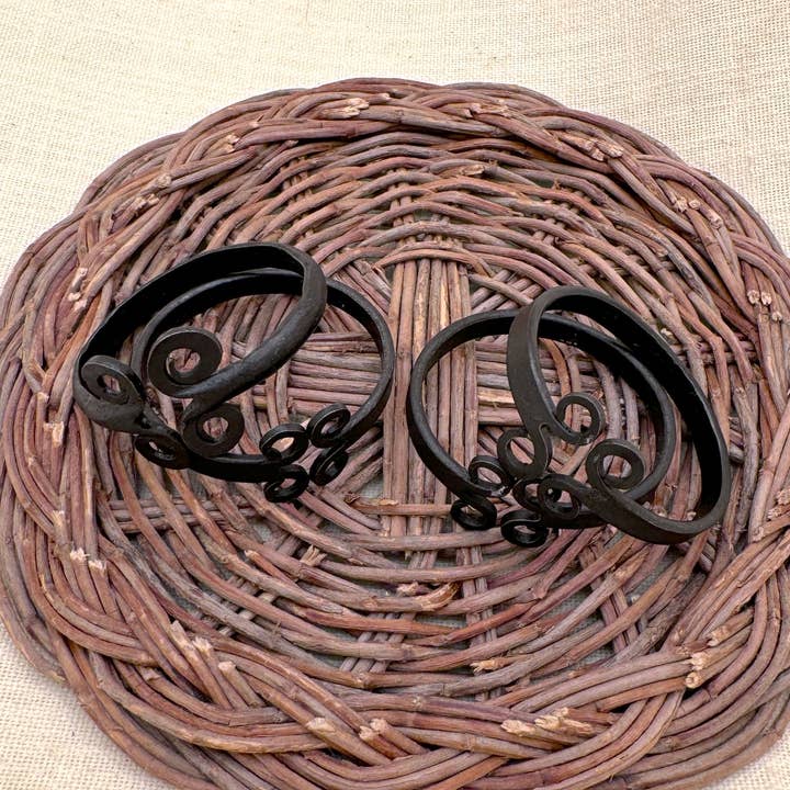 Handforged Double Swirl Napkin Ring, India for wholesale by Tesoros Trading Company