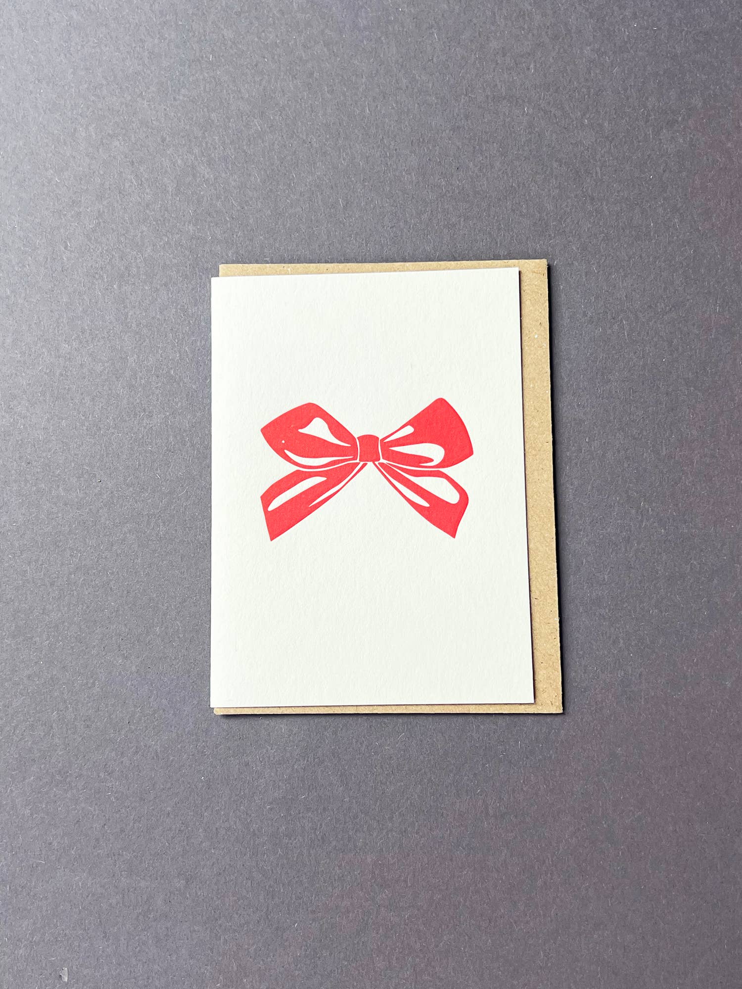 Penguin Ink - Wholesale Christmas Card - Red Bow Card