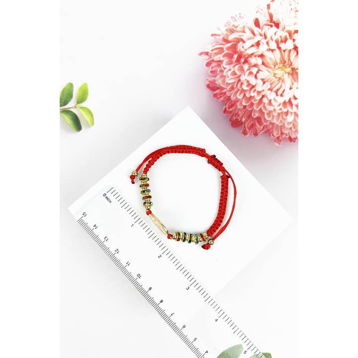 ASSORTED RED STRING RELIGIOUS BEADED BRACELET for wholesale on Faire1