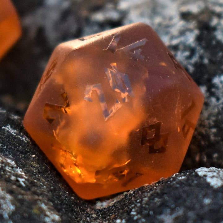 Gates of Helheim Raised Lava Glass Dice Set for wholesale by Misty Mountain Gaming