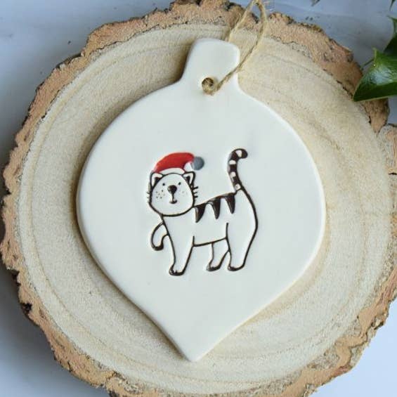 Christmas - Cat with Santa Hat - Handmade ceramic bauble for wholesale by Broadlands Pottery