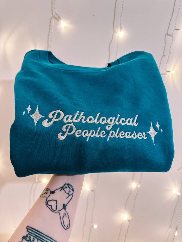 Sudadera bordada con cuello redondo de complaciente patológico. para venta al por mayor de Tired Girl Apparel