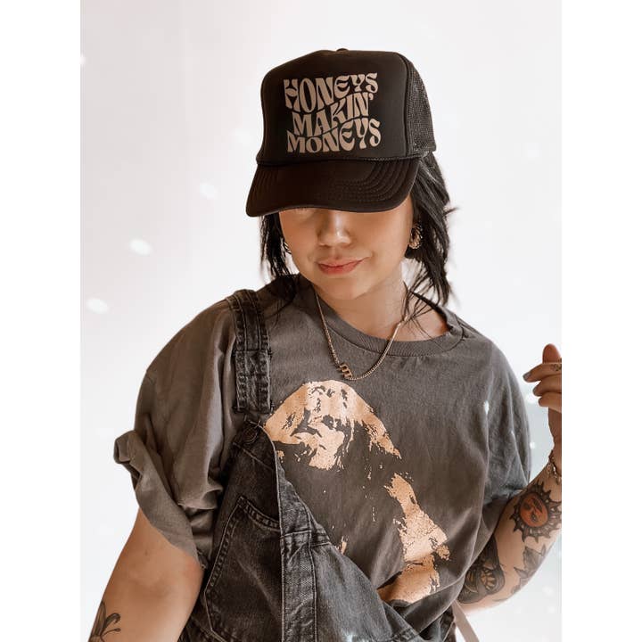 Honeys Makin’ $ Woman Owned Trucker Hat - Black and other Purchase Wholesale honey hat. Free Returns & Net 60 Terms on Faire trending on Faire.