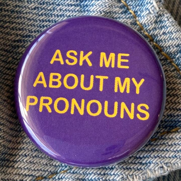 Ask Me About My Pronouns Pin-back Button for wholesale by Double Denim Dude