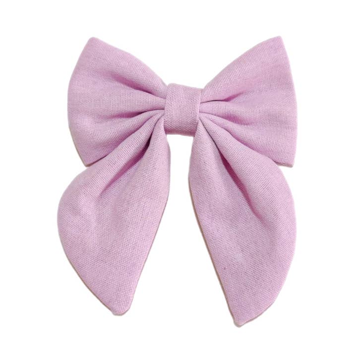 Fiocco per Capelli in Lino Solido Color Lilla Chiaro con Clip per la vendita all'ingrosso da parte di Pretty in Pink Bows