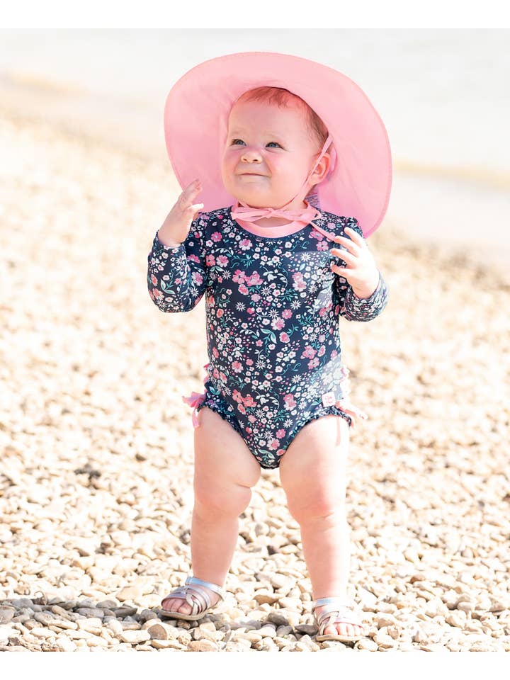 RuffleButts + RuggedButts - Wholesale Rashguard - Baby - Baby Girls Moonlit Meadow Long Sleeve One Piece Rash Guard Swimsuit with Signature Rear Ruffles
3