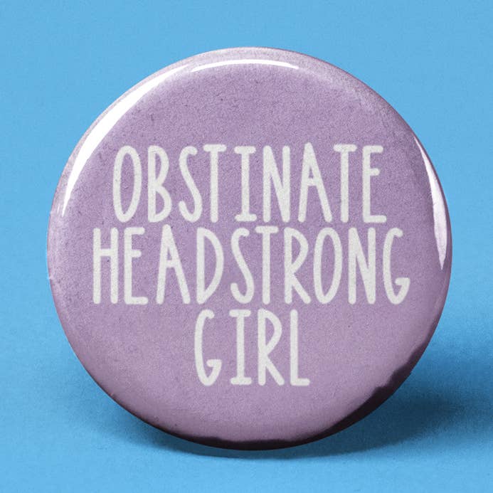 Obstinate Headstrong Girl Pinback Button for wholesale by The Pin Pal Club