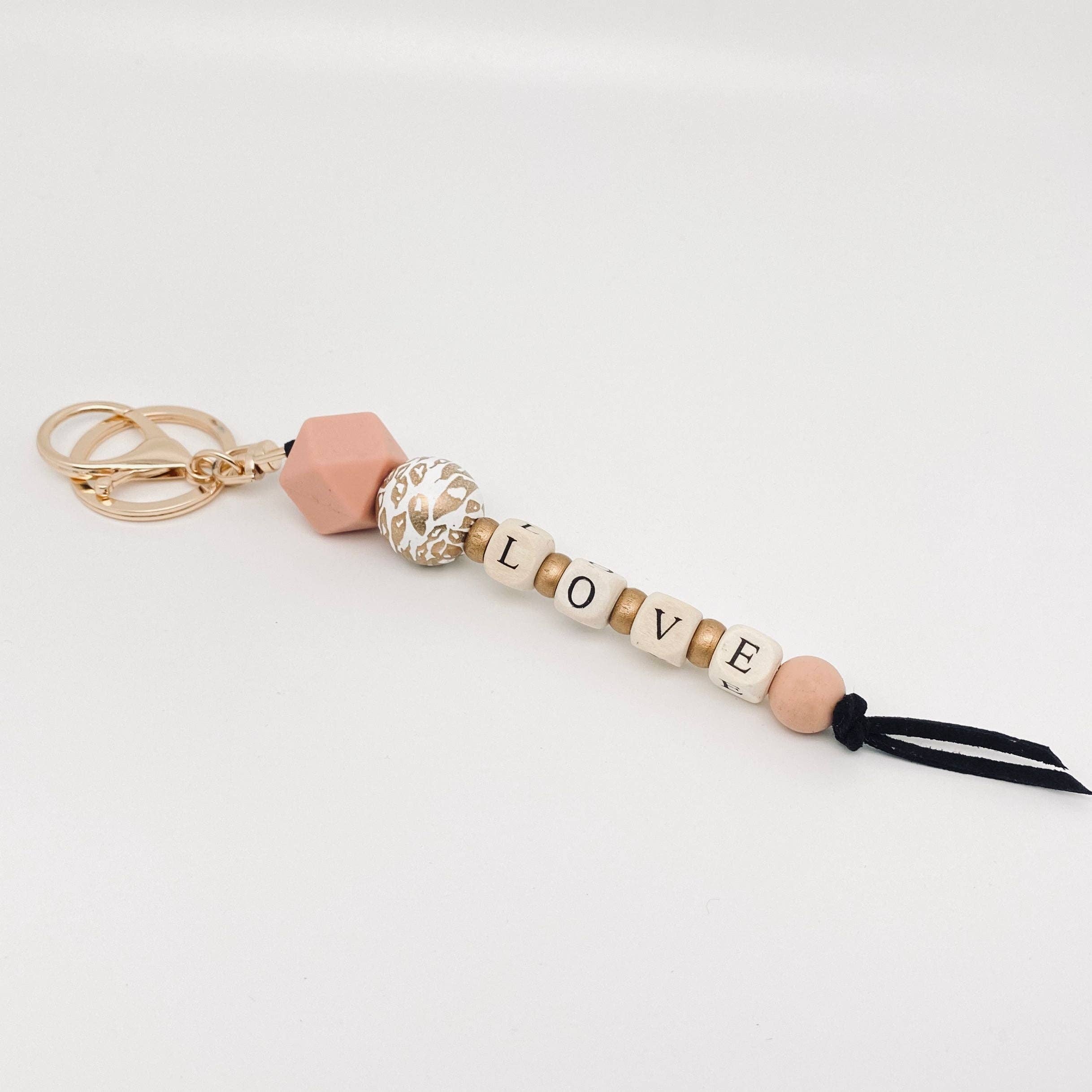 Mio Queena – wholesale Nyckelringar - Dam – Bohemisk stil silikon trä pärlstav nyckelring | Prydnad11