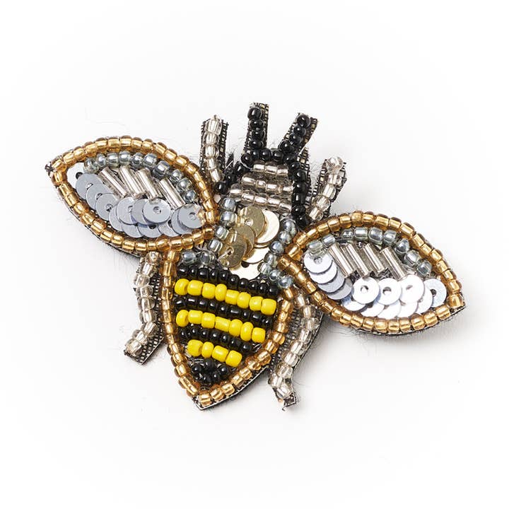 Bala Mani Beaded Bee Brooch Pin - Handmade, Fair Trade and other Purchase Wholesale eye pins. Free Returns & Net 60 Terms on Faire trending on Faire.