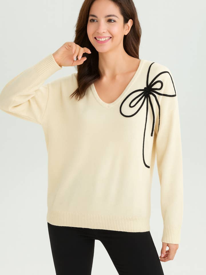 SOFT KNIT JUMPER WITH BOW DESIGN for wholesale by Lucy Sparks