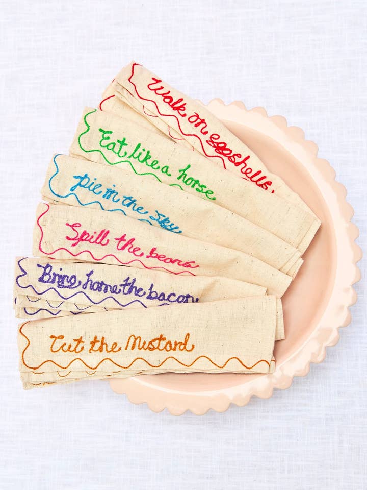 Embroidered Food Proverb Napkins (Set Of 6) for wholesale by See+QUIN Ltd