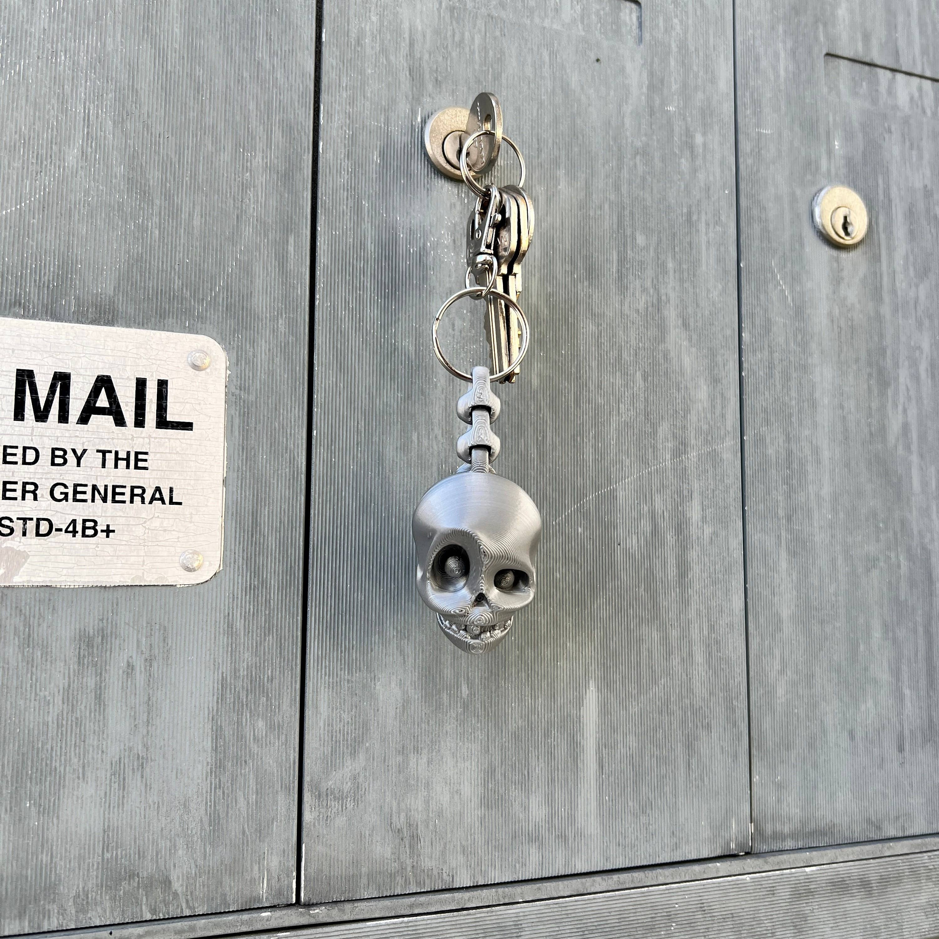 NumanPrints – wholesale Nyckelring - Unisex – Skull KeyChain Flexi Spine 3D-tryckt tryck med7