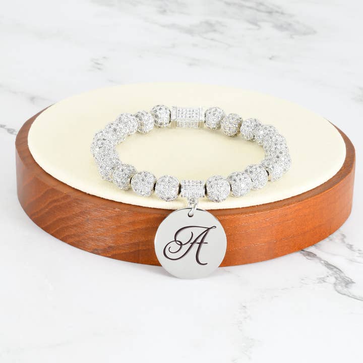 Pulsera elástica inicial helada para venta al por mayor de Pink Box