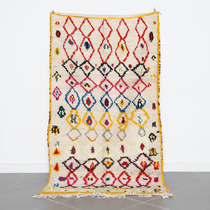 Vibrant Handwoven Moroccan Rug with Diamond Patterns for wholesale by MUSMUSRUGS