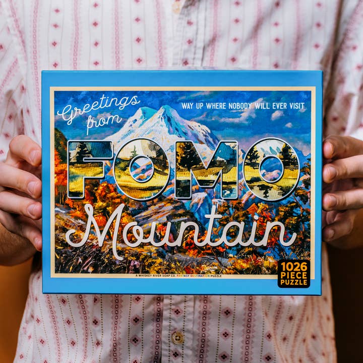 Greetings from FOMO Mountain | Funny Puzzle for wholesale by Whiskey River Soap Co.