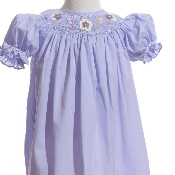 Purple Daisies Smocked Short Sleeve Bishop Dress for wholesale by Hello Bebes!