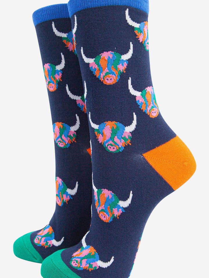 Women's Rainbow Highland Cow Print Bamboo Socks in Navy Blue for wholesale by Sock Talk