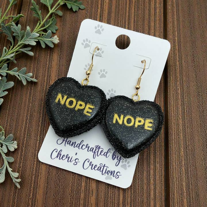 NOPE Black Heart Macaron Dangle Earrings – Handmade Polymer Clay Earrings for wholesale by Cheri's Boutique Supplies