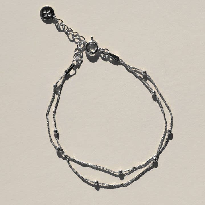 Silver Double Layer Saturn Chain Bracelet for wholesale by Nickel and Suede