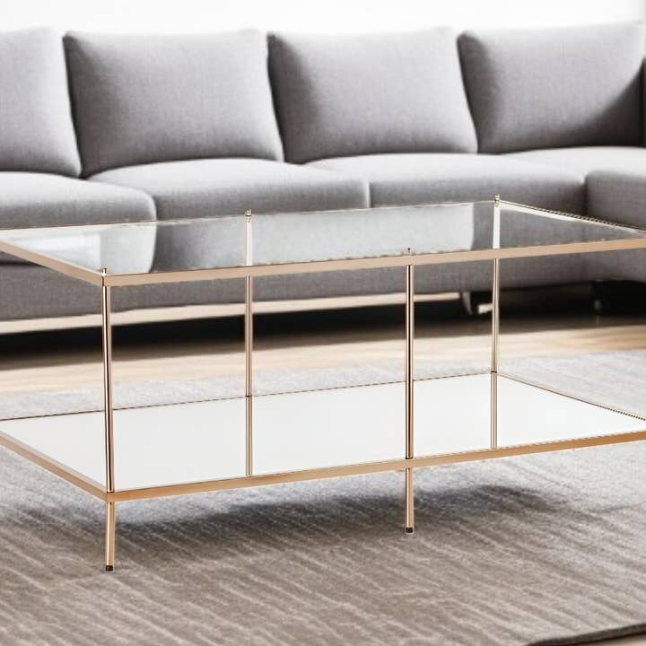 42" Clear And Gold Glass And Metal Coffee Table for wholesale by HomeRoots