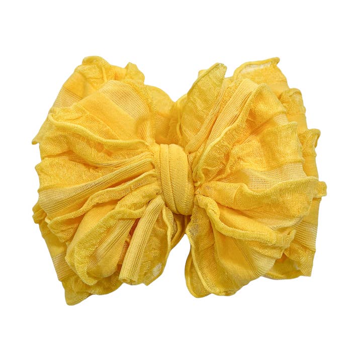 Cerchietto con volant girasole per la vendita all'ingrosso da parte di Rockin Royalty