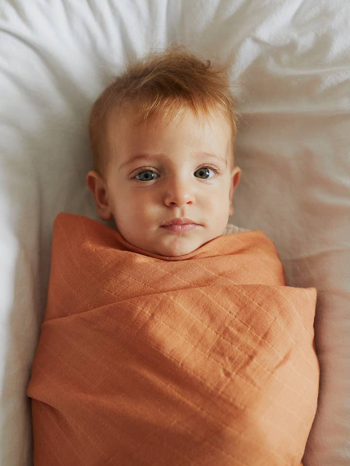 Clay Muslin Swaddle for wholesale by Milk & Honey Brand
