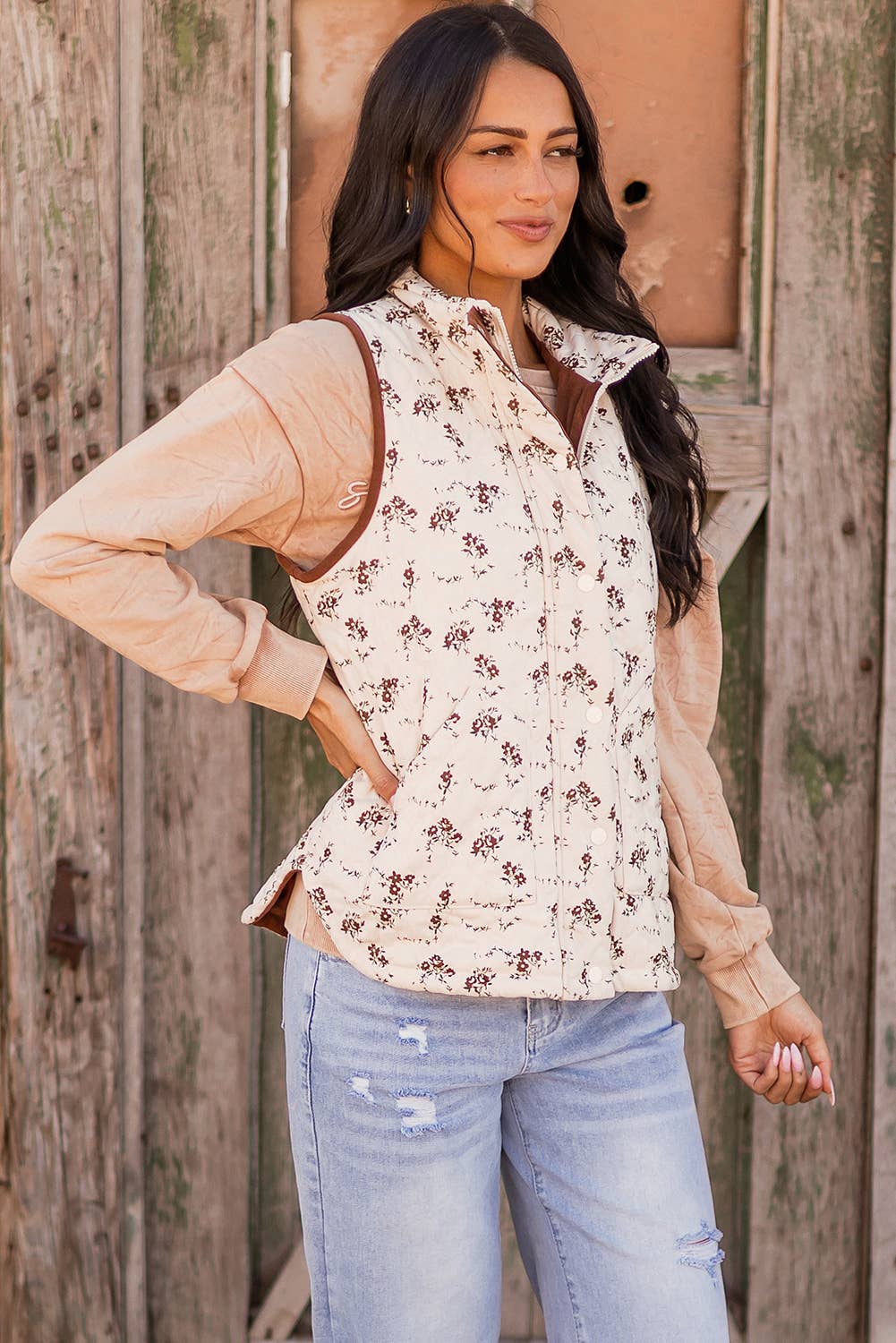 As shown Fashion-W Floral Print Zip Up Quilted Vest for wholesale on Faire5