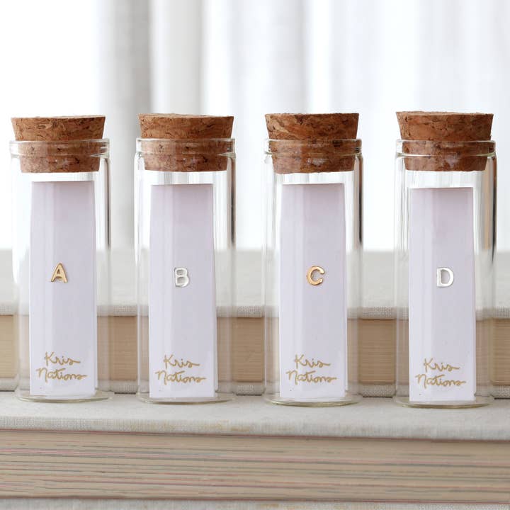 SINGLE Letter Stud Earrings for wholesale by Kris Nations