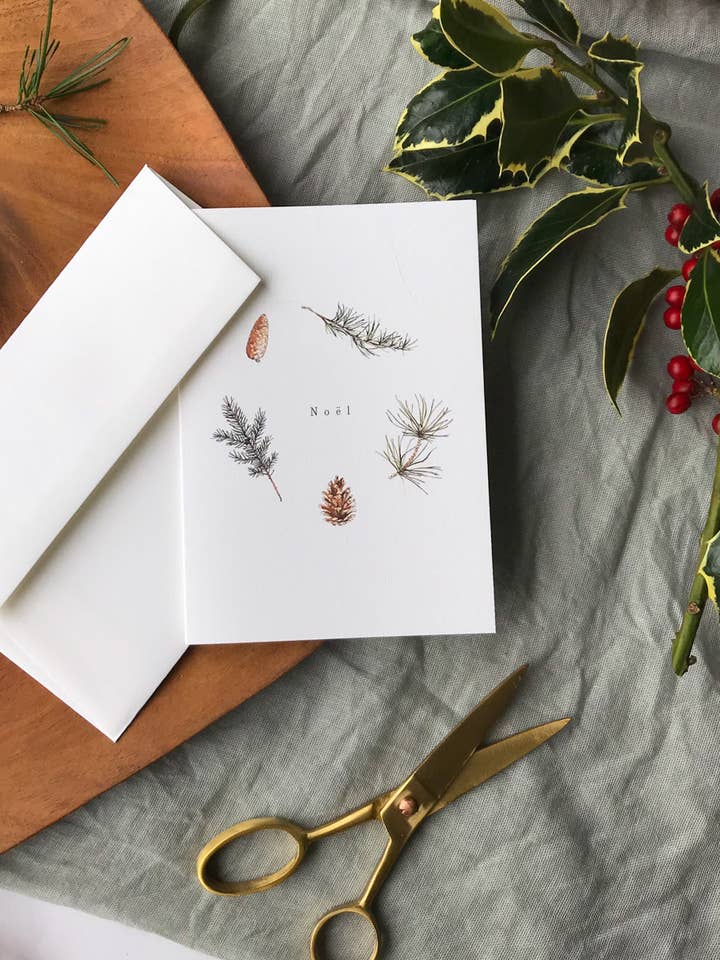 Noel Botanical Foliage Luxury Christmas Card for wholesale by Annie Brougham Paper Goods.