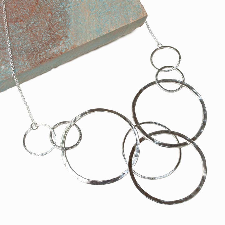 Around We Go Silver Necklace for wholesale by RockHill Designs