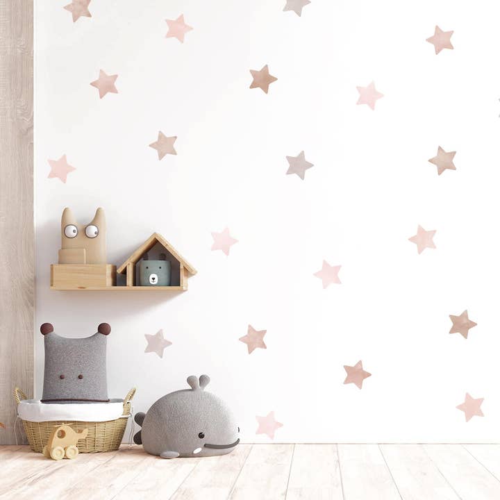 Boho akvarel stjerne vægklistermærker, neutrale akvarel stjerne vægdekorationer, lyserøde stjerne børneværelse vægklistermærker, legerumsdekoration for engroshandel hos Decals Online