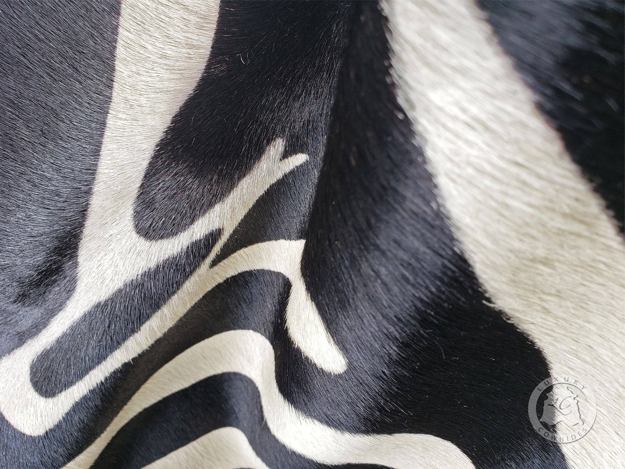 Zebra Black Stripes on Off White Cowhide Rug for wholesale on Faire1