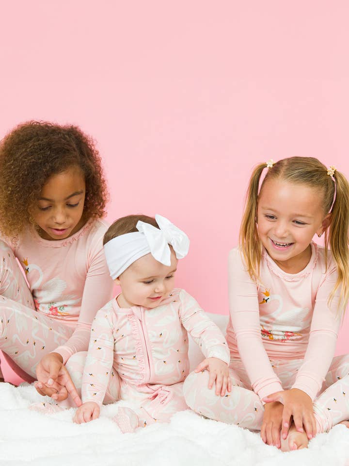 Pink Toddler Girls Swan Lake Dream Bamboo Viscose Ruffle Long Sleeve Pajama Set
for wholesale on Faire