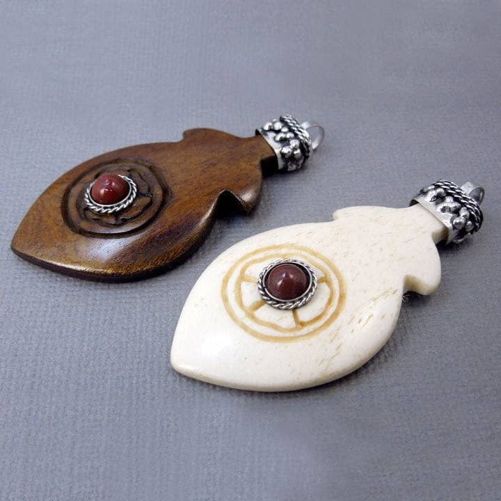 Tibetan Carved Bone Feather Pendant with Coral Crystal for wholesale by Rock Paradise