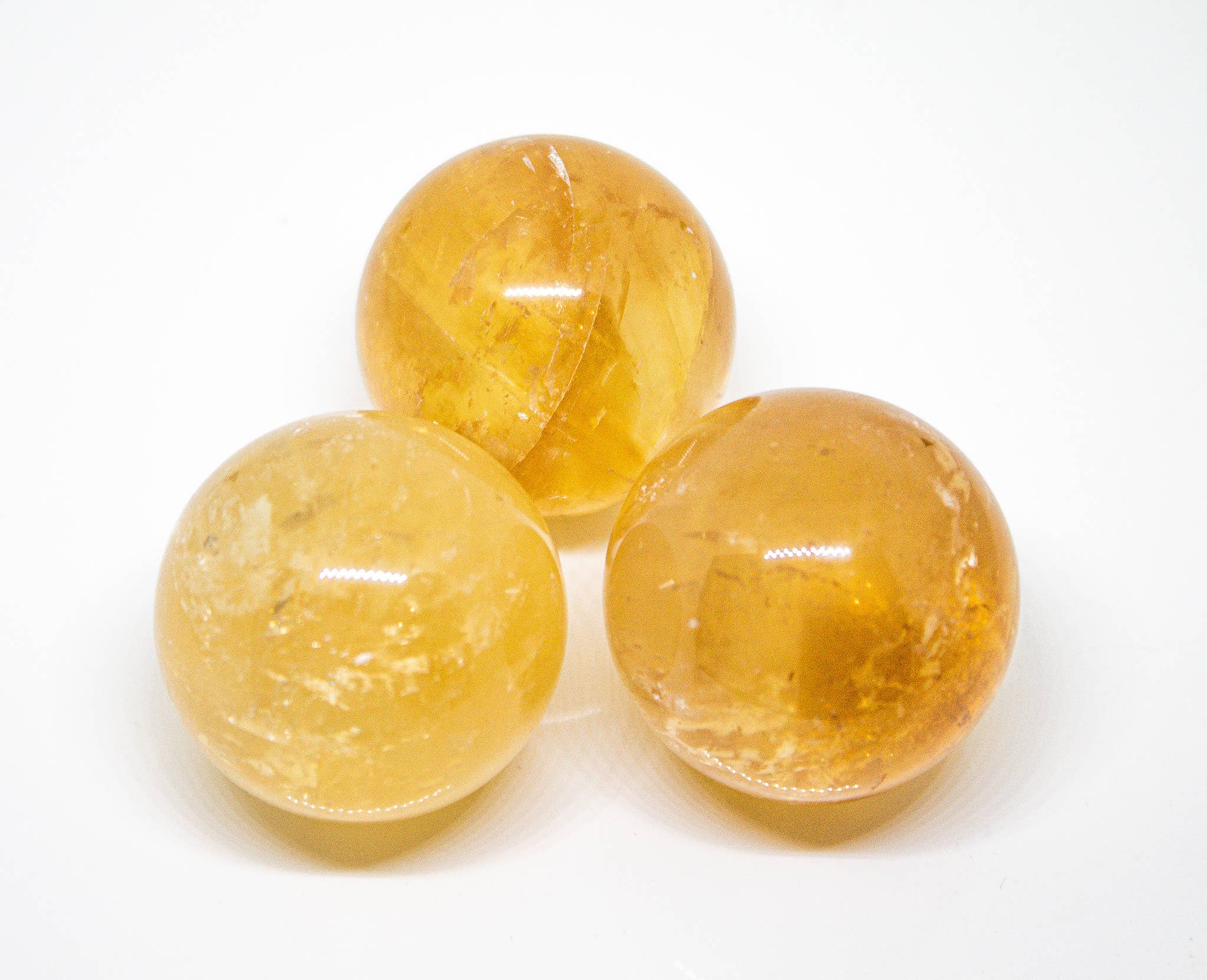 Quasar Gems USA - Wholesale Spiritual Stone/Crystal - Honey Amber Calcite Sphere 30mm1