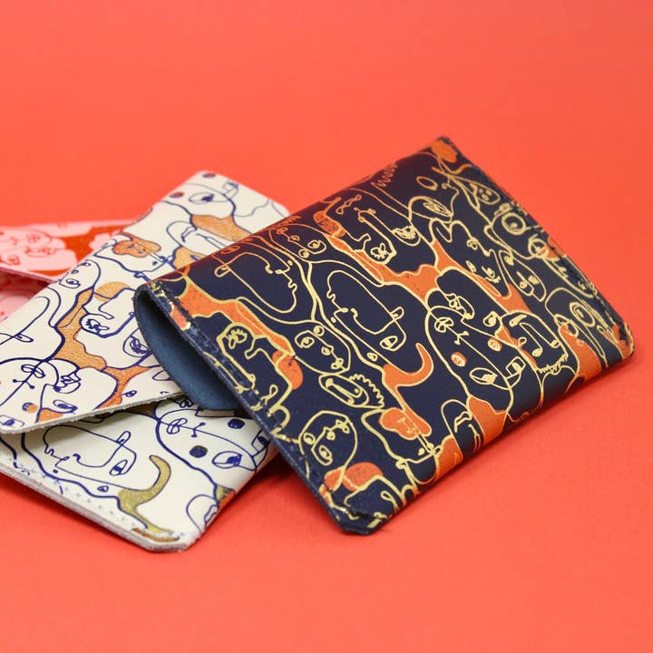 Many Faces Popper Purse for wholesale by Ark Colour Design