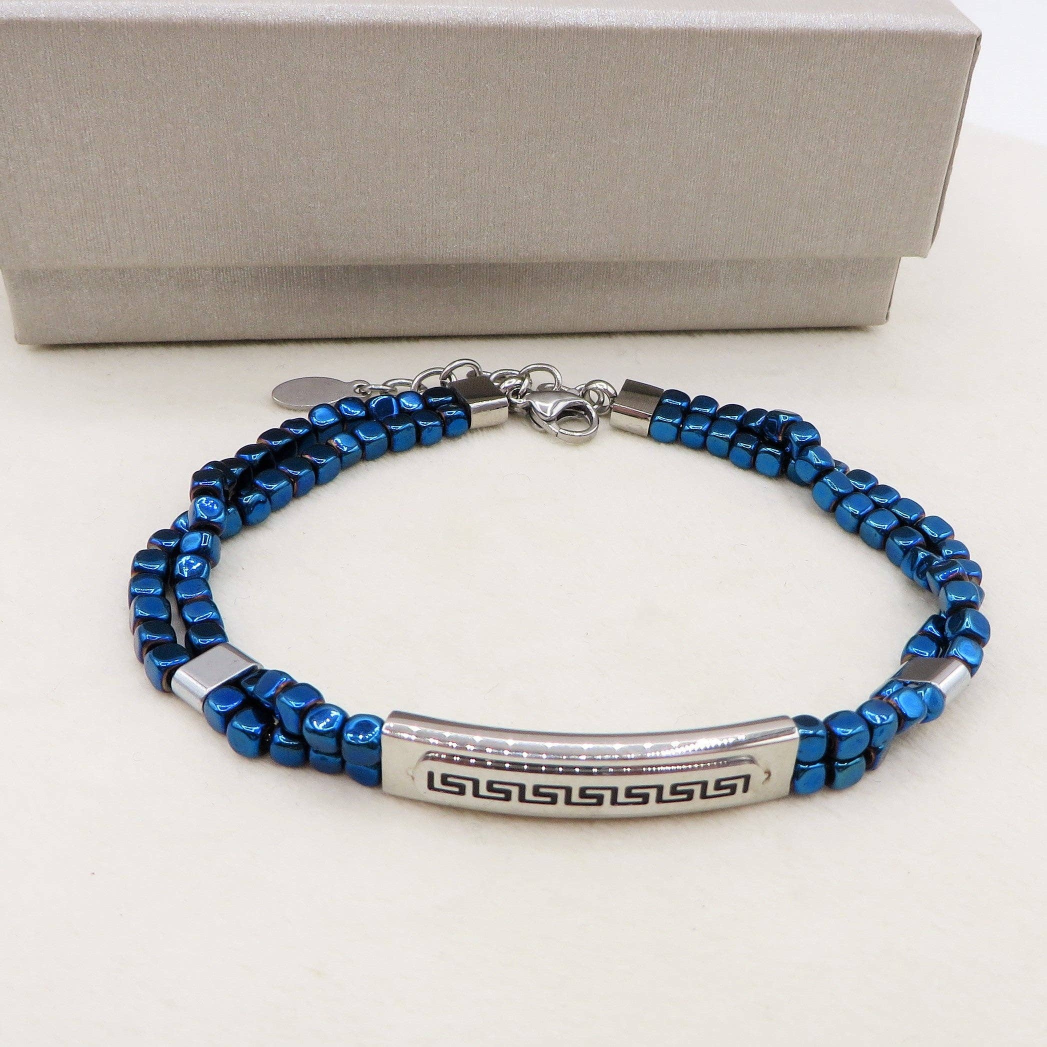 ARES Bracciale uomo  Targhetta con greche e cubetti in ematite BLU  -  ACCIAIO INOSSIDABILE for wholesale on Faire3