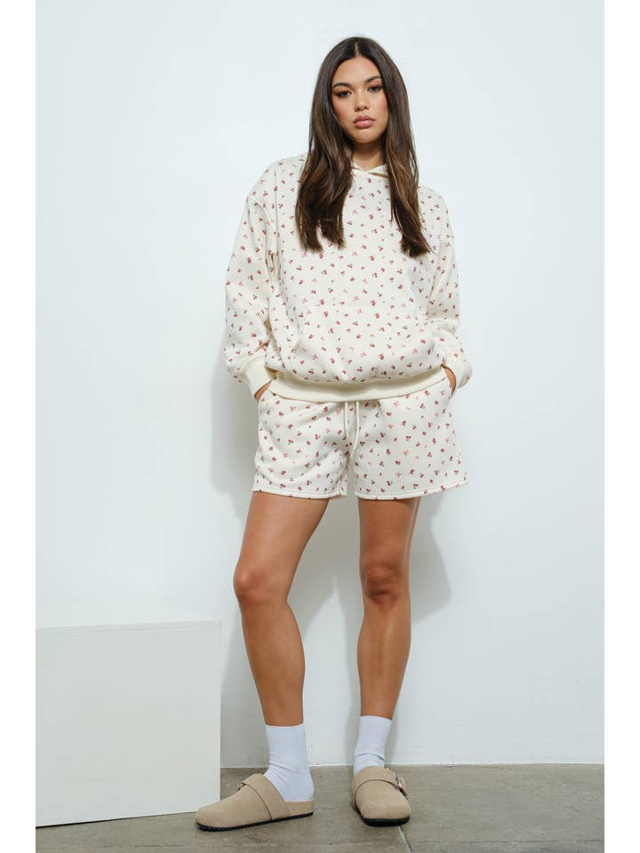 Ivory CHERRY BOW PRINT SWEATSHIRT for wholesale on Faire
