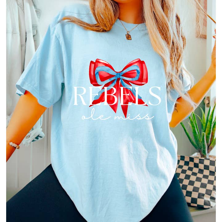 Preppy Ole Miss Rebels Coquette Bow Football Graphic Tee for wholesale by Gia Gifts Boutique