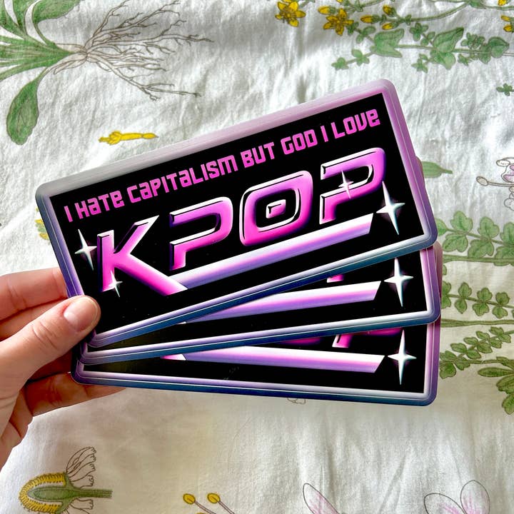 Autocollant pour pare-chocs « I Hate Capitalism but God I Love Kpop » pour la vente par Hollandaize Art