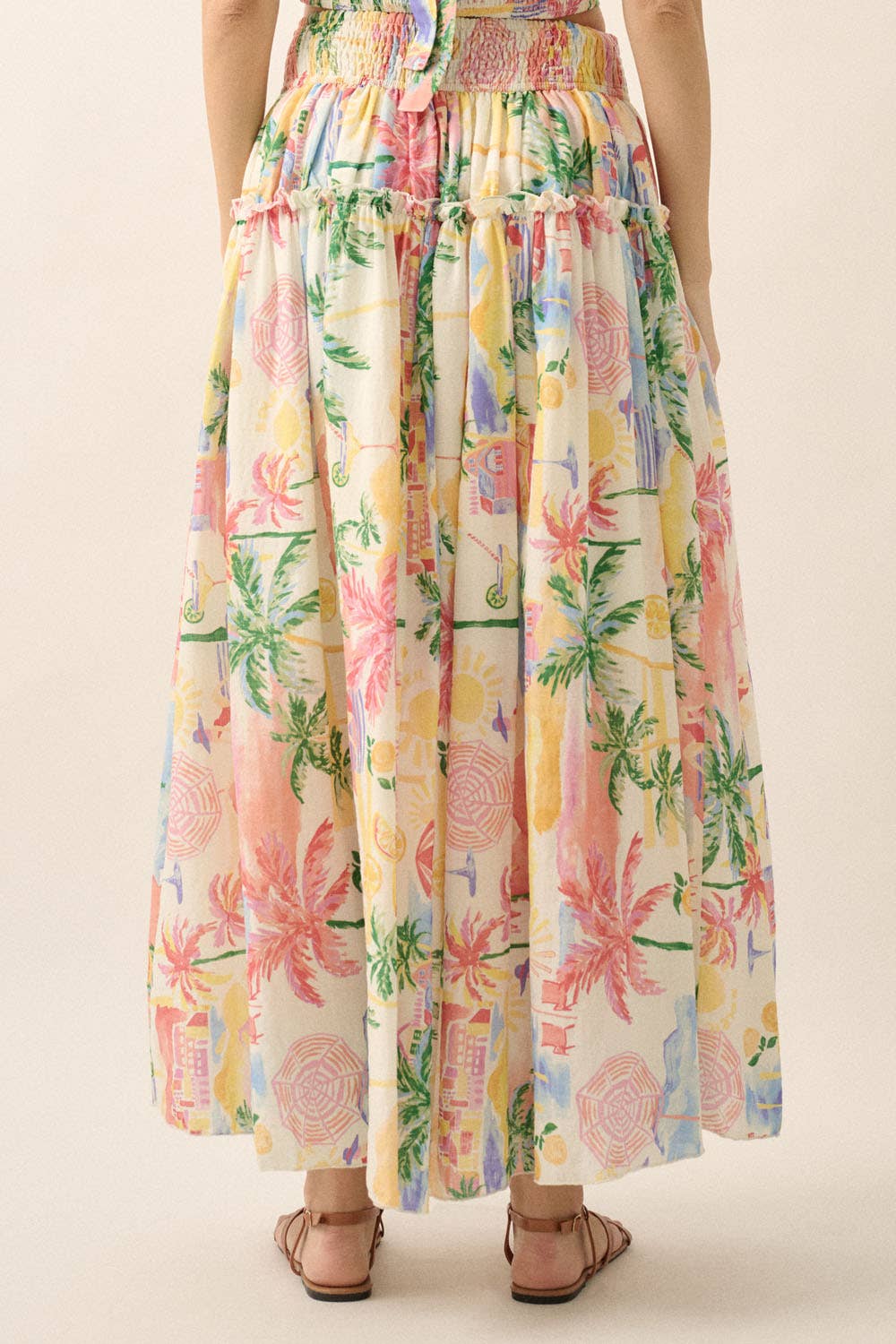 Crème Jupe longue smockée à imprimé aquarelle tropical. en vente sur Faire9