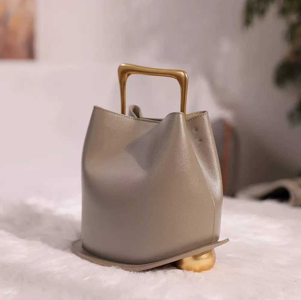 Sook Stainable – wholesale Top handle bag – women's – Geometric Artistic Design Metal Handle Leather Bag7