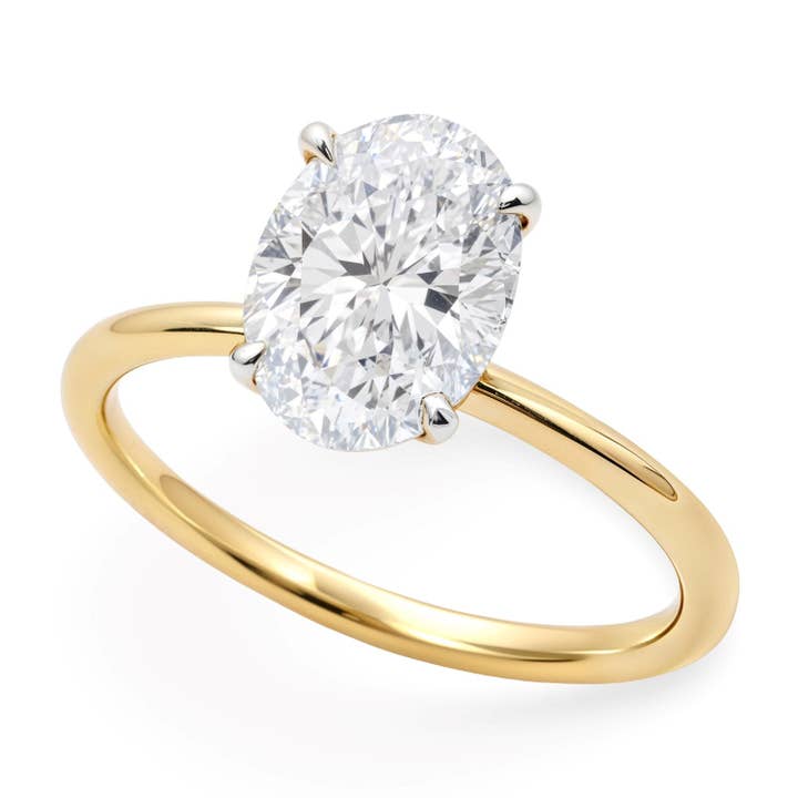 Bague solitaire en or jaune 10K avec diamant ovale de 1 1/2 carat cultivé en laboratoire IGI G/VS1. pour la vente par RubyAnn Jewelry