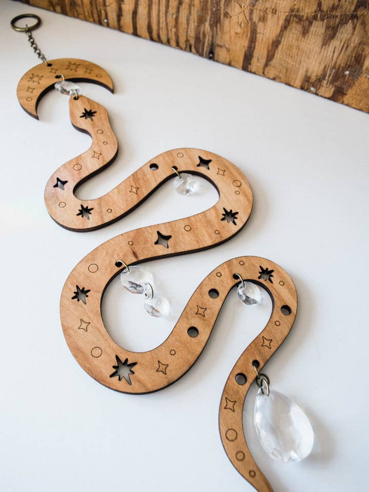 Starry Snake Suncatcher Wooden Wall Hanging Crystal Prisms for wholesale by HEX Botanical