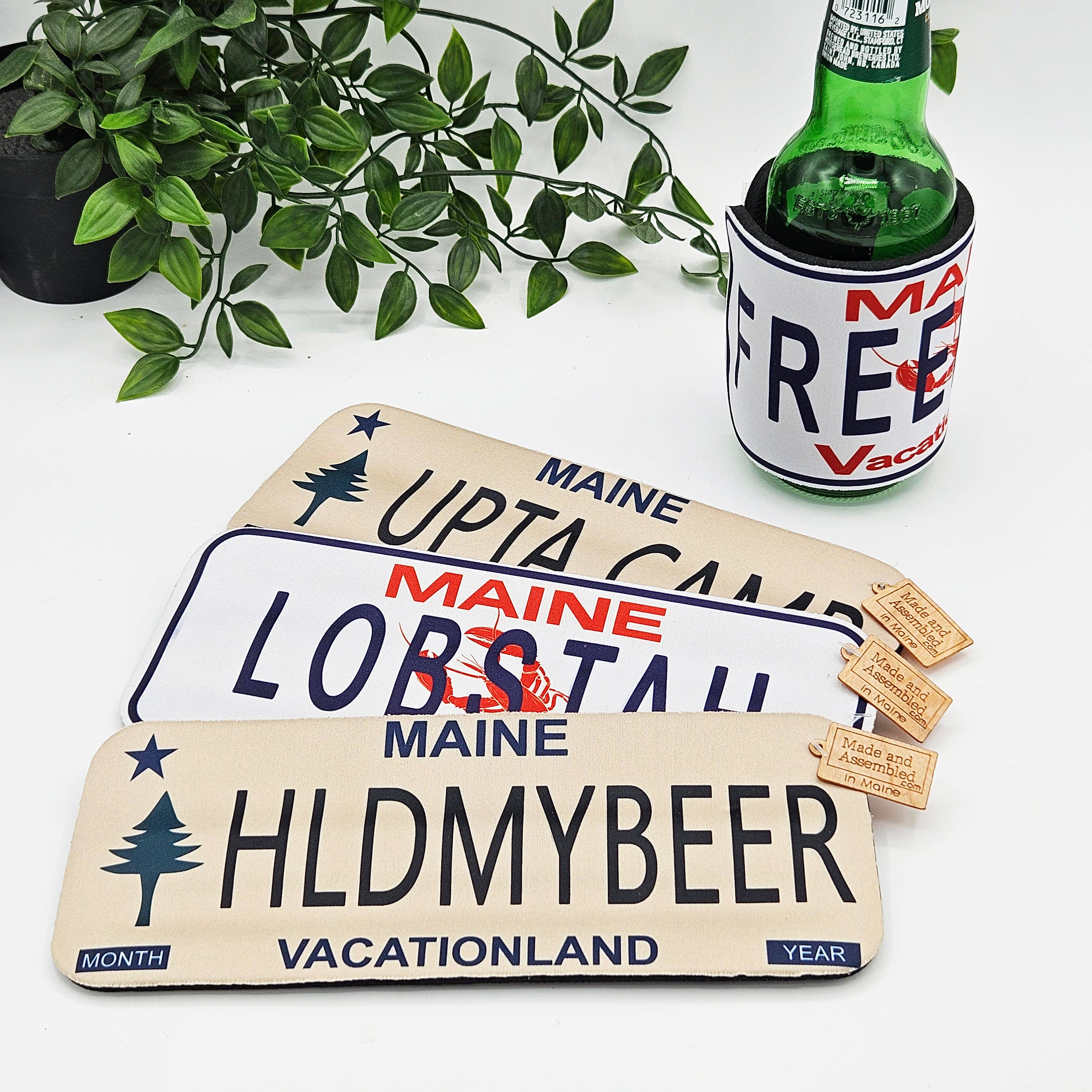 Made and Assembled - Wholesale Drink Huggers & Koozies - Slap Koozies - License Plate Designs0