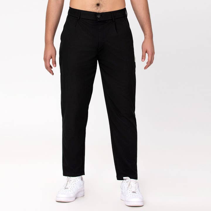 Pantaloni aderenti con pieghe frontali per la vendita all'ingrosso da parte di PLACED BY GIDEON