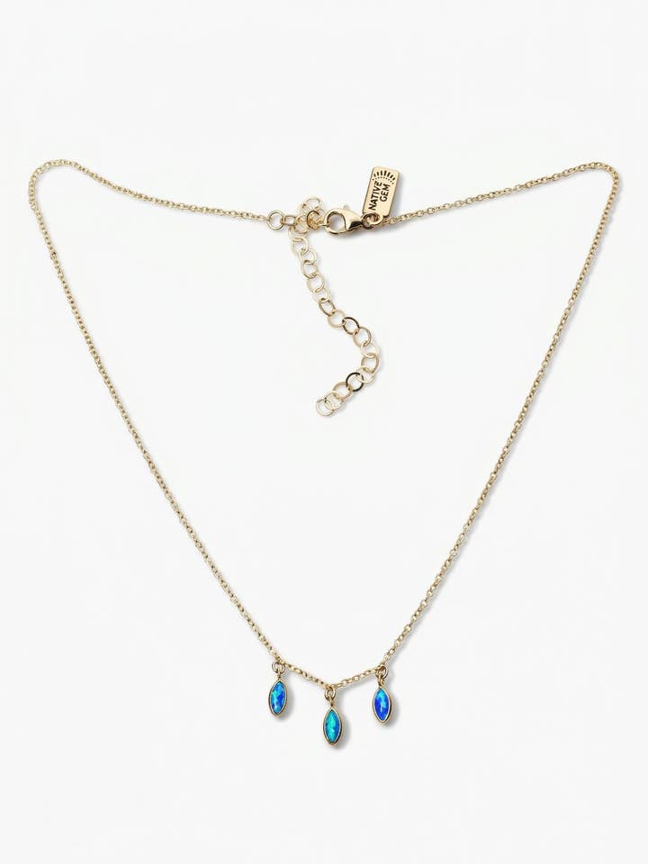 COLLIER EN FORME DE GOUTTES DE PLUIE, OPALE BLEUE, OR 14 CARATS pour la vente par Native Gem